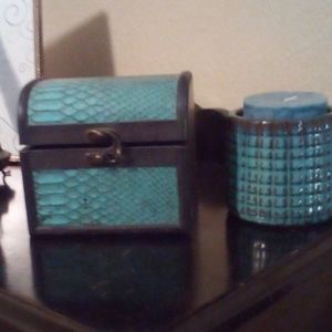 Turquoise and a brassy color little Lock storage box with candle holder